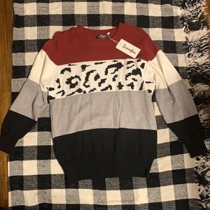 Color block snow leopard sweater.
